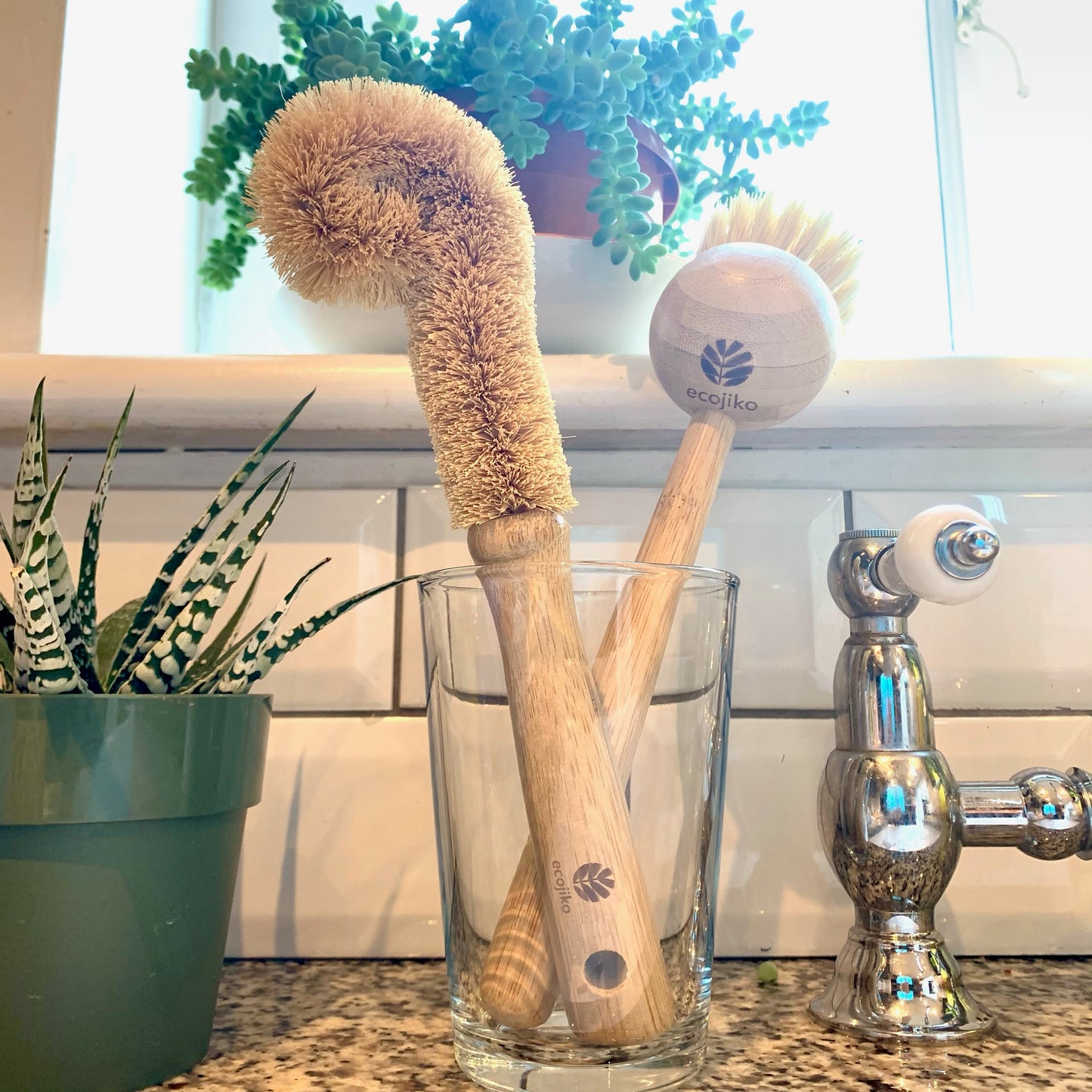 bamboo bottle brush and dish brush in kitchen