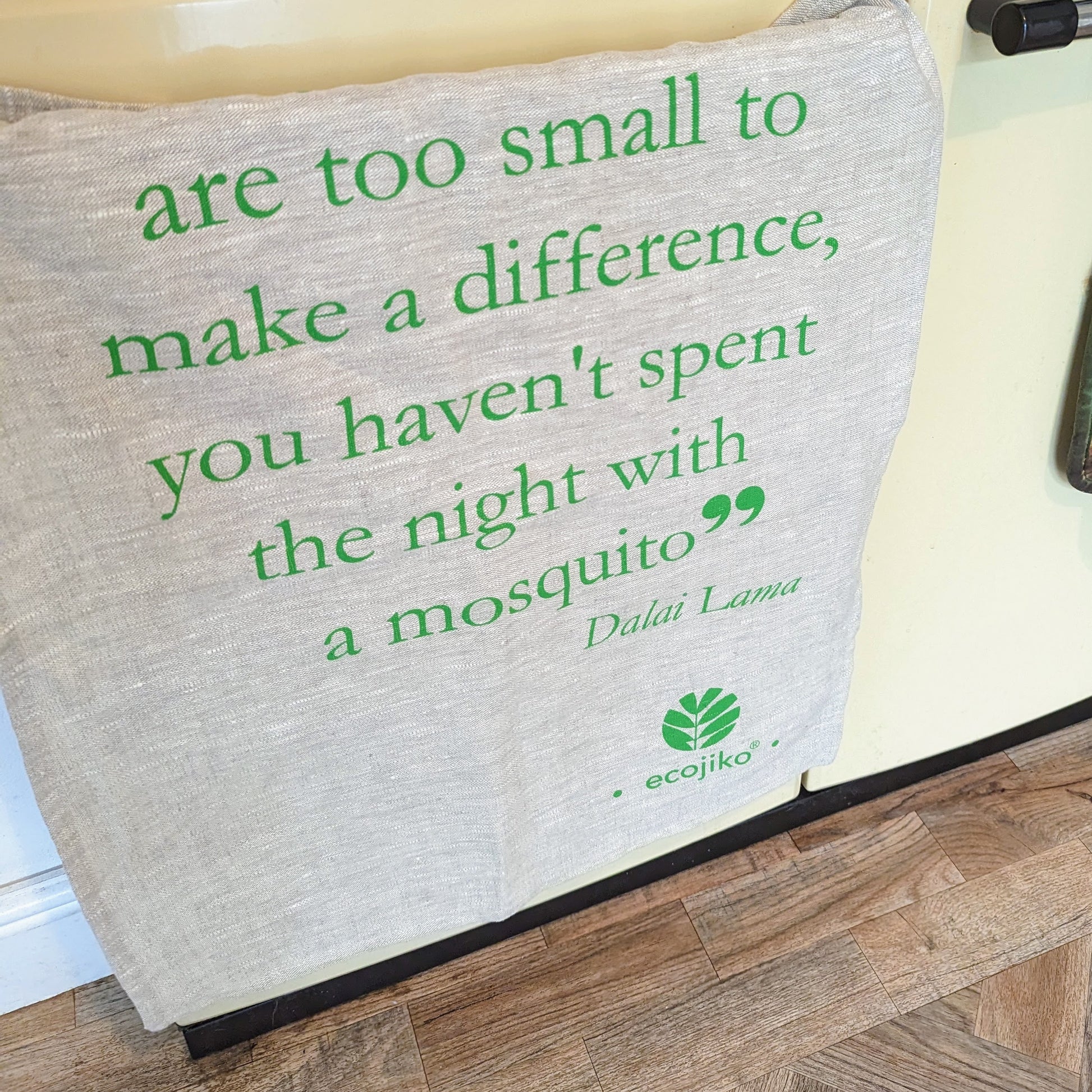 linen tea towel with eco friendly inspirational quote