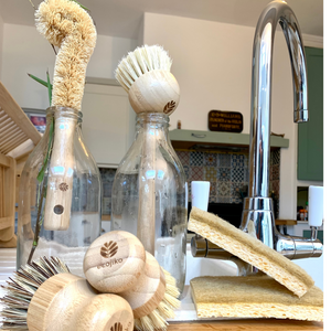ecojiko bamboo brushes cellulose sponges zero waste kitchen starter kit in a kitchen